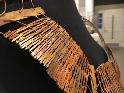 University of Iowa alum Hannah Dufie Sakyiama displays “My Piece,” a neckpiece inspired by Anansi, at the annual jewelry and metals exhibition at Winthrop’s Lewandowski Student Gallery (photo: Yashuri Del Rosario Rodriguez).